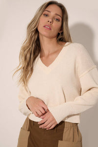 Solid Knit Exposed-Seam V-Neck Sweater